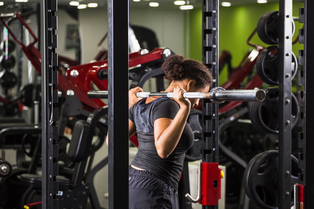 Smith Machine Squats: Correct Form, Benefits, Debate, and Variations ...